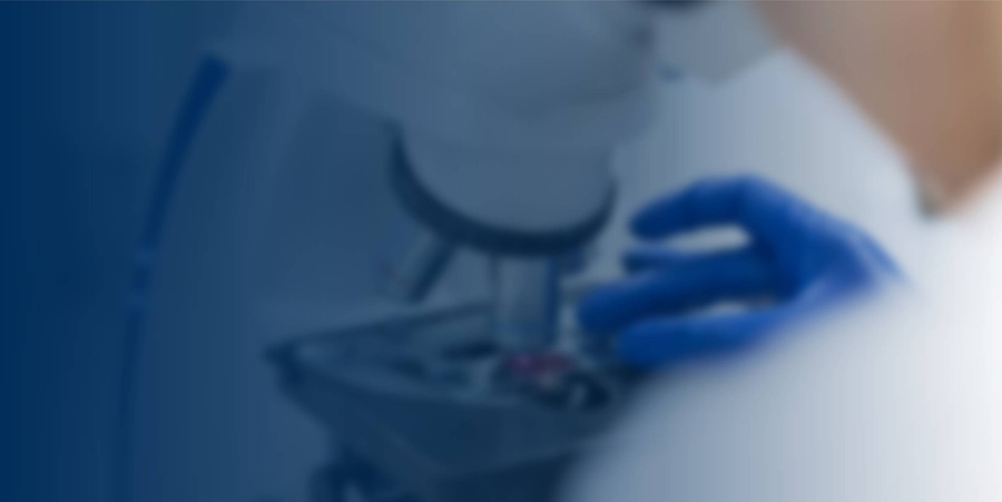 Background image of microscope close-up.